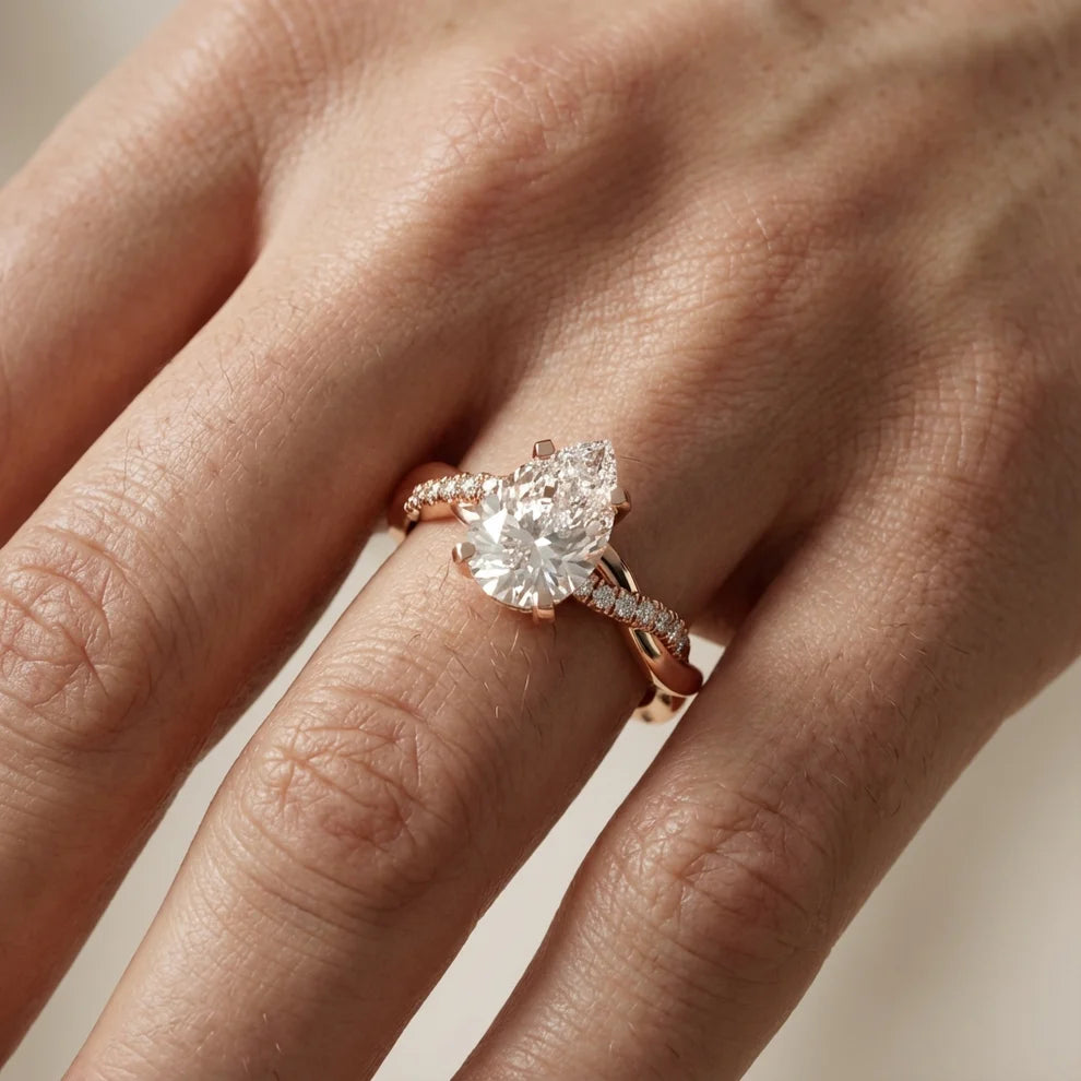 Twisted Side Stone Round Diamond Engagement Ring