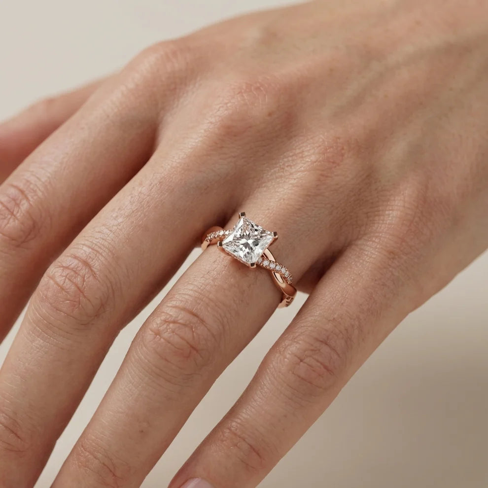 Twisted Side Stone Round Diamond Engagement Ring