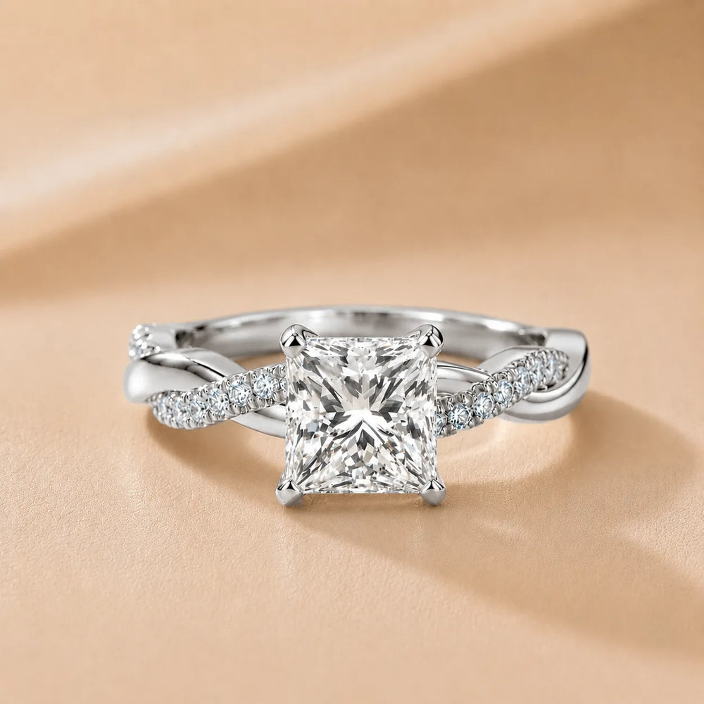 Twisted Side Stone Round Diamond Engagement Ring