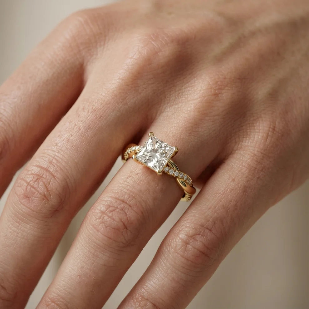 Twisted Side Stone Round Diamond Engagement Ring