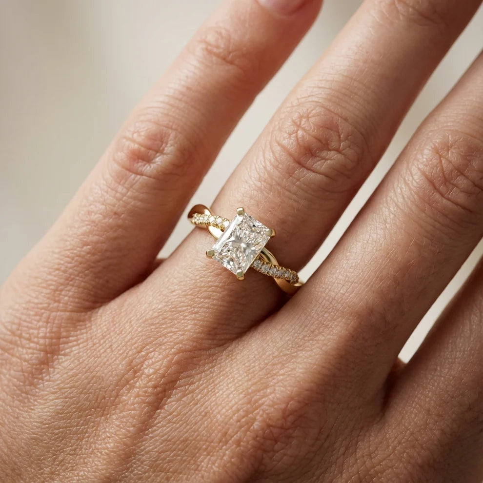 Twisted Side Stone Round Diamond Engagement Ring