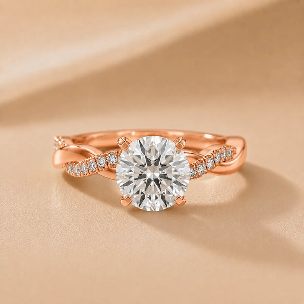 Twisted Side Stone Round Diamond Engagement Ring