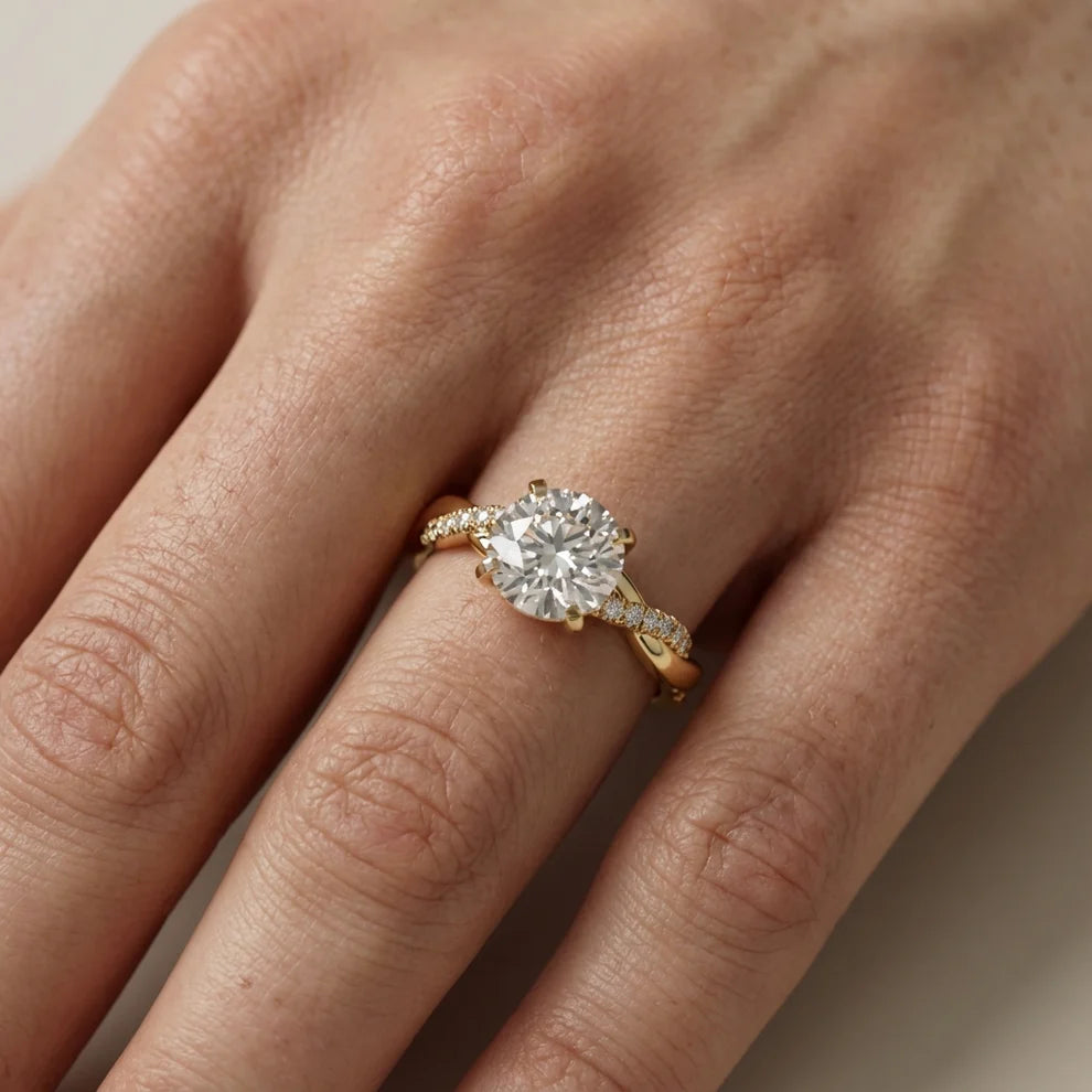 Twisted Side Stone Round Diamond Engagement Ring