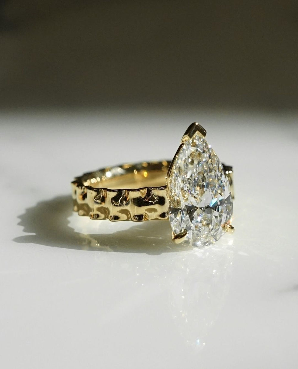 Lasagna Band Elongated Pear Cut Labgrown Engagement Ring
