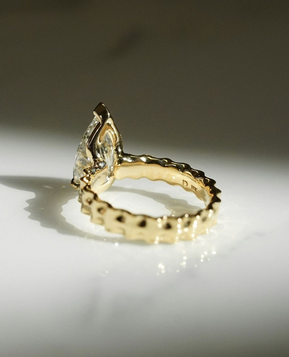 Lasagna Band Elongated Pear Cut Labgrown Engagement Ring