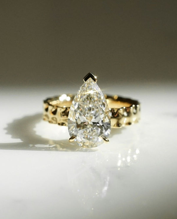 Lasagna Band Elongated Pear Cut Labgrown Engagement Ring