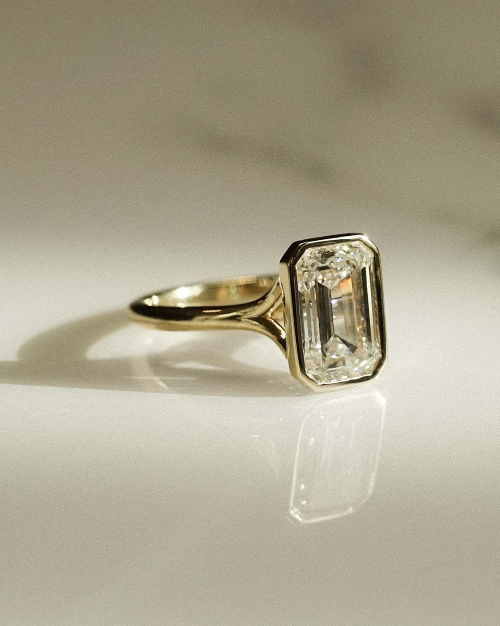 Bezel Set Emerald Cut Labgrown Engagement Ring
