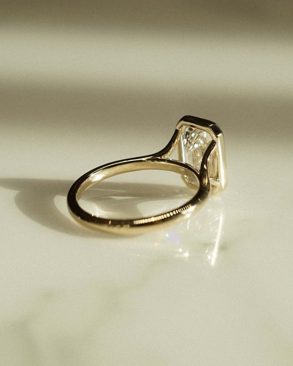 Bezel Set Emerald Cut Labgrown Engagement Ring