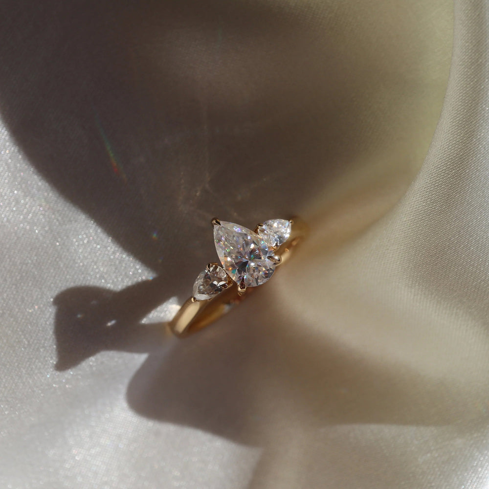 Three Stone Elongated Pear Cut Labgrown Engagement Ring