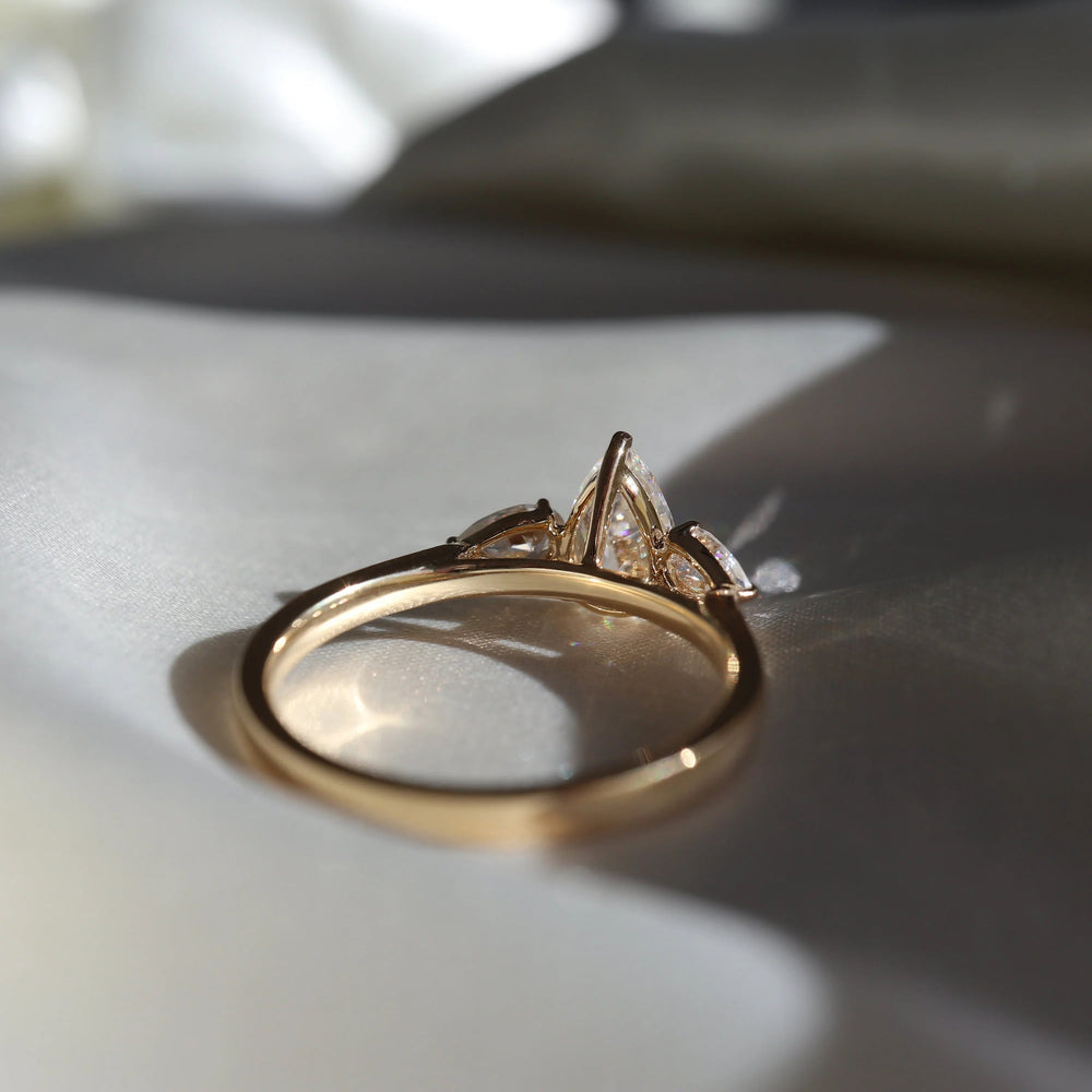Three Stone Elongated Pear Cut Labgrown Engagement Ring